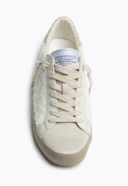 Zapatillas deportivas blancas con borreguito y detalle dorado | Bluwer
