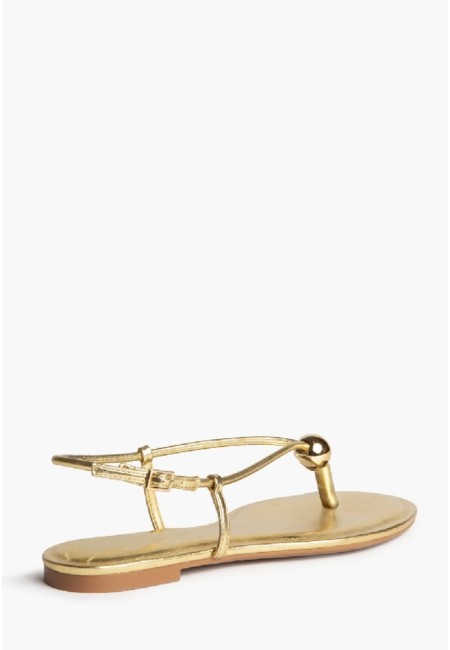 Sandalia plana dorada con tiras finas y hebilla | Bluwer