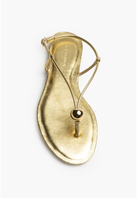 Sandalia plana dorada con tiras finas y hebilla | Bluwer 2