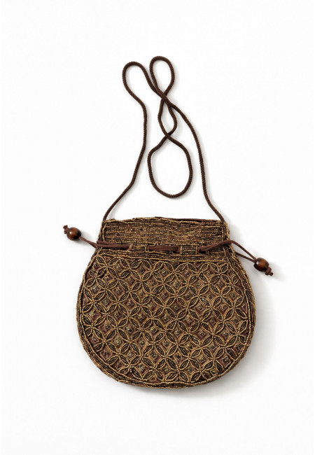 Bolso bombonera artesanal con lentejuelas doradas