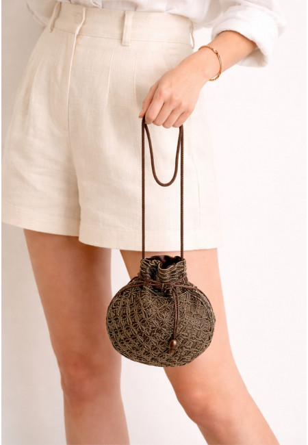 Bolso bombonera artesanal con lentejuelas doradas