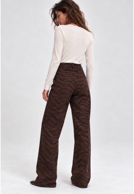 Pantalón vaquero ancho con estampado de cebra marrón | Bluwer